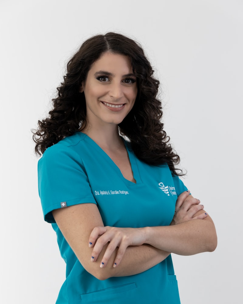 Clinician in teal scrubs